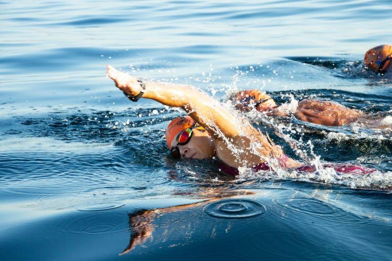 Anna Zuccolotto competes in an open water swimming race. 