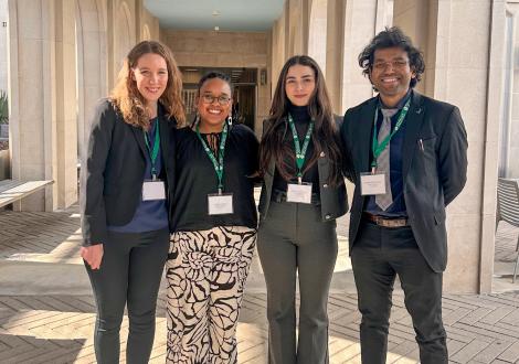 Fletcher students pose for a photo outside.