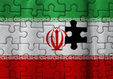 An Iranian flag made of puzzle pieces with one missing