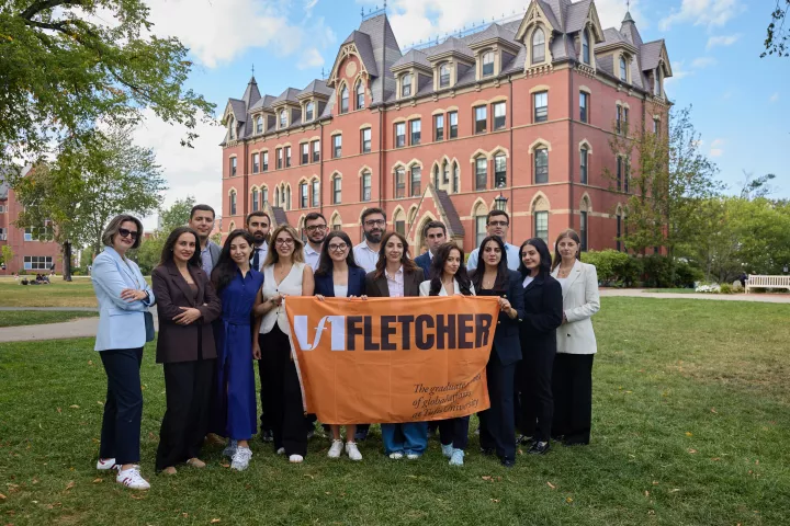 The 2025 cohort of the Tavitian Scholars Program posing for a group photo at Tufts University.