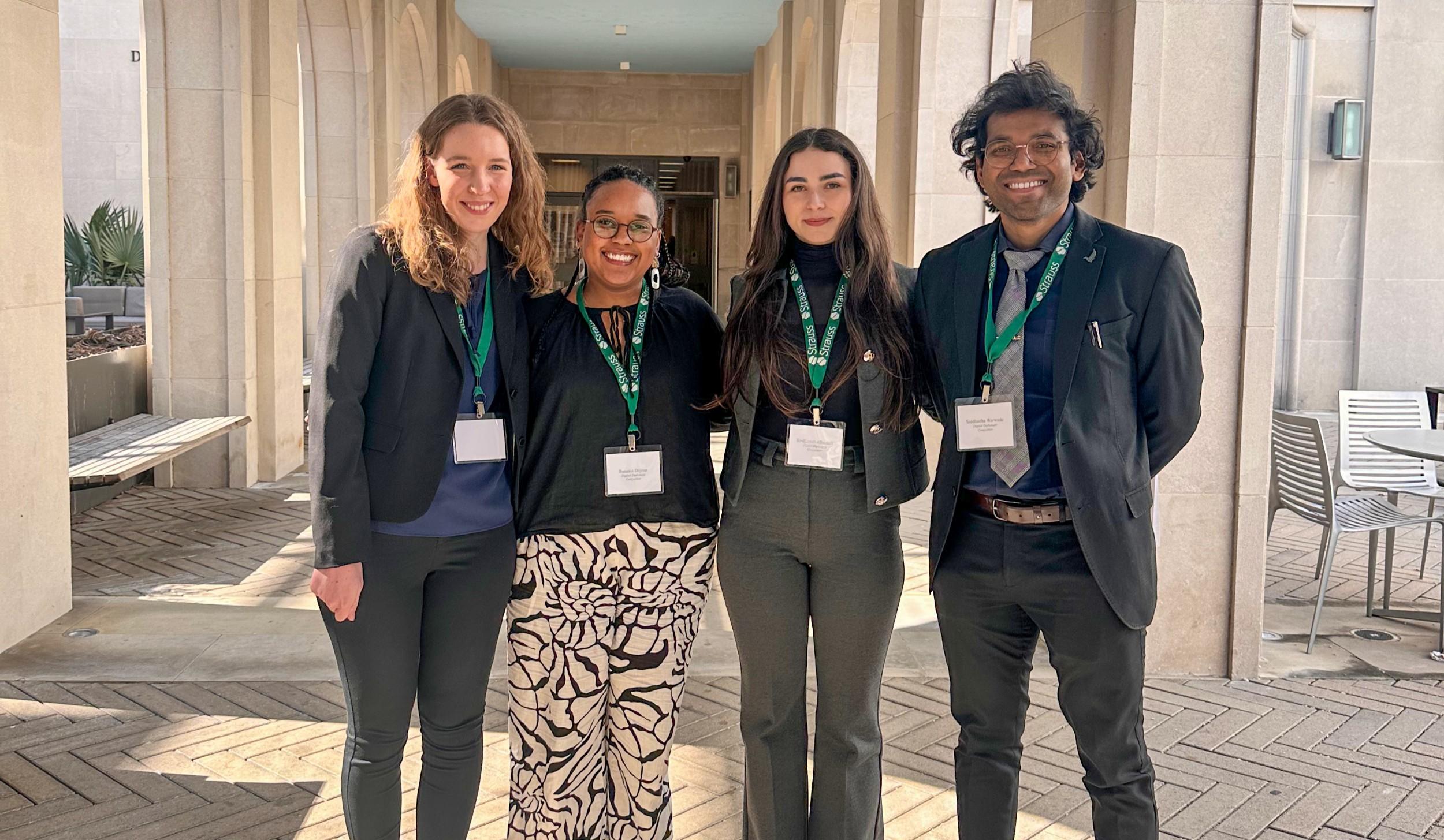Fletcher students pose for a photo outside.