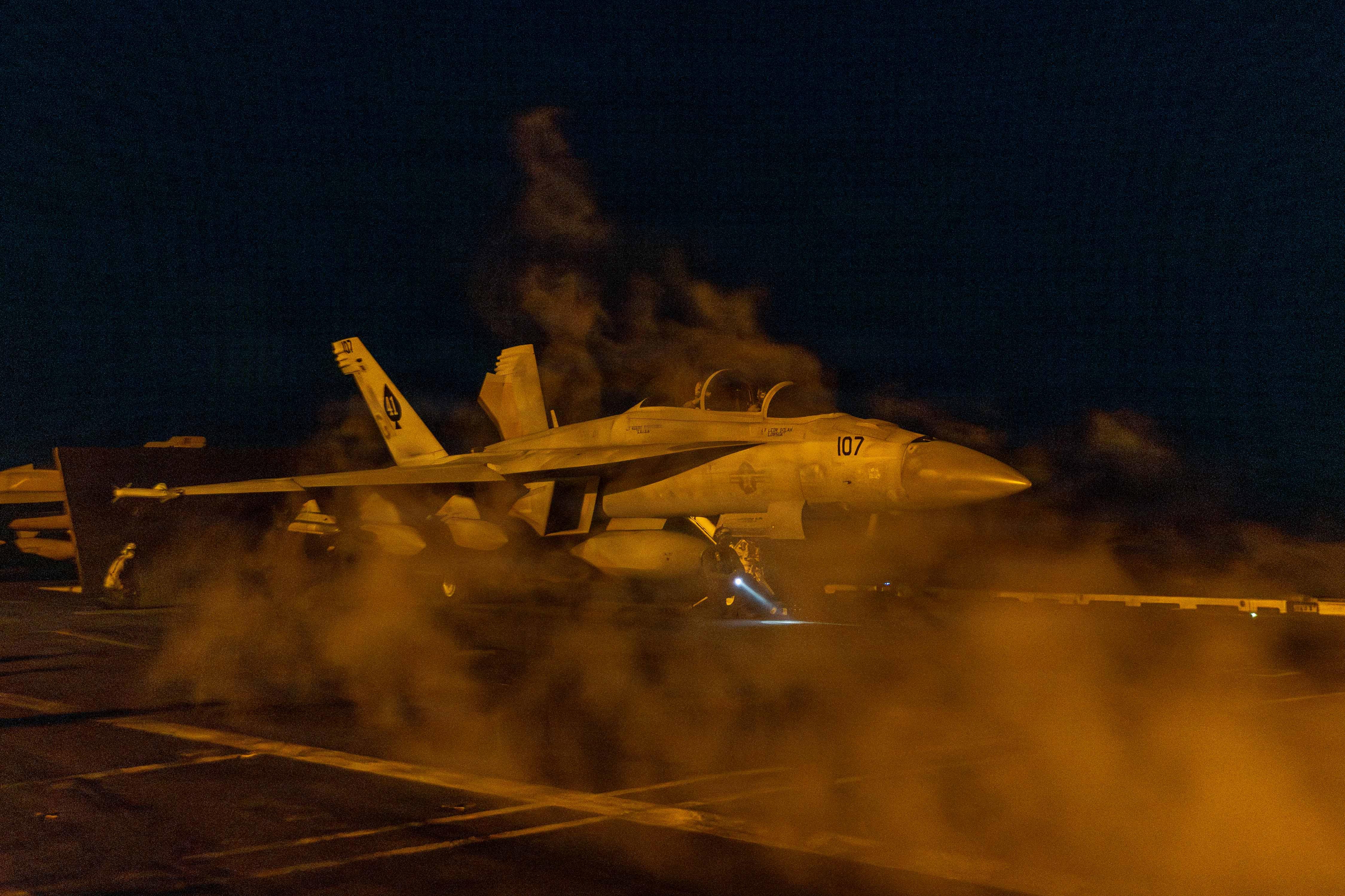 An American fighter plane prepares to launch in support of Operation Epic Fury