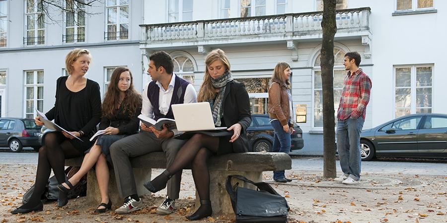 Exchange students sitting on a bench