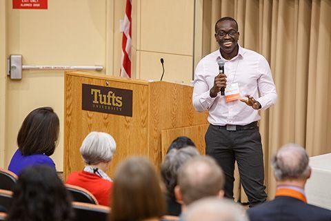 Alumni volunteer speaking at Tufts