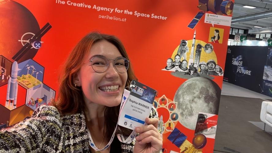 Sophia Warner poses on the exhibition floor at the International Astronautical Congress.