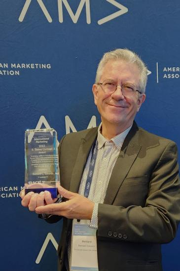 Professor Bernard Simonin with his AMA Award