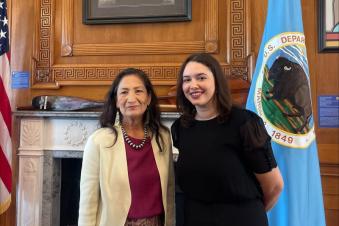 Natasha Frazier and Secretary Deb Haaland pose for a picture. 
