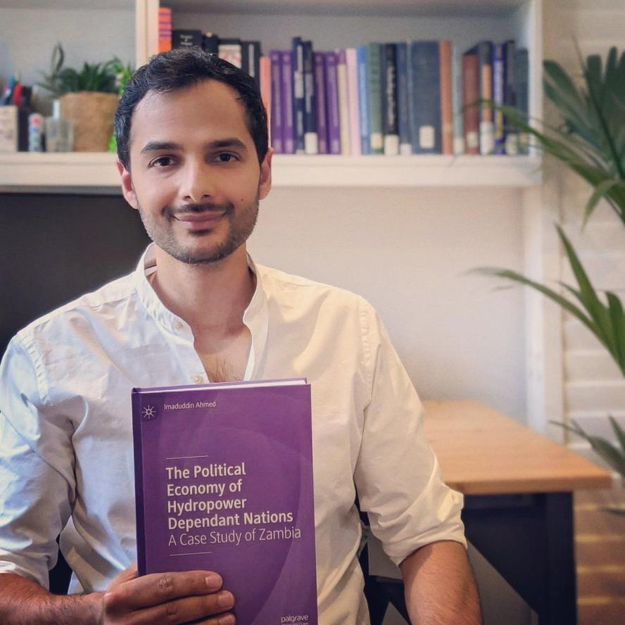 Imad Ahmed with his book The Political Economy of Hydropower Dependant Nations