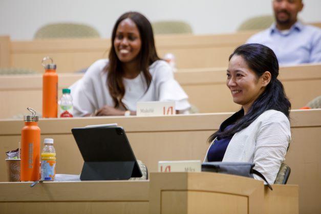 GMAP students sitting in a lecture hall.