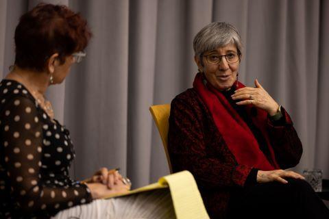 Dr. Sima Samar and Professor Kimberly Theidon speak on stage.