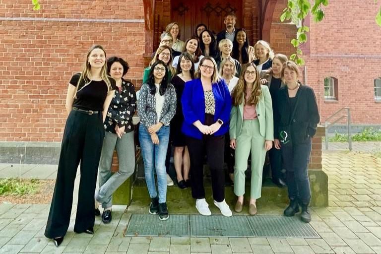 A group shot of participants at a conference in Berlin.