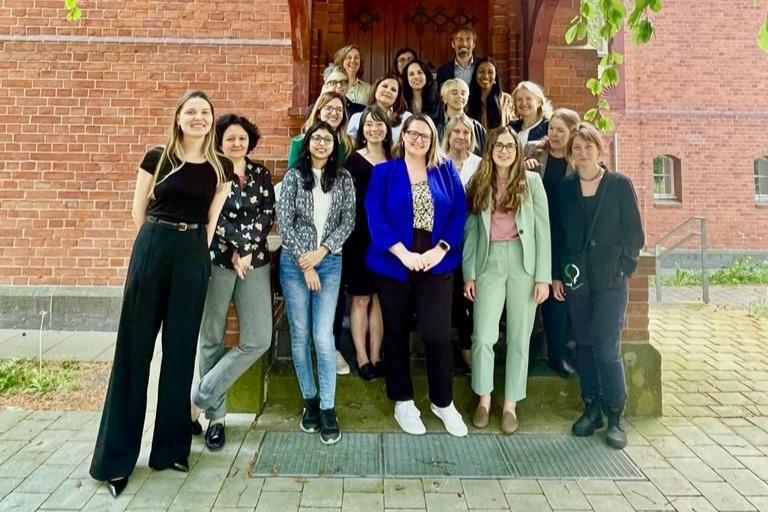 A group shot of participants at a conference in Berlin. 