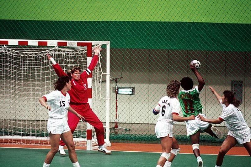 Two women's teams play handball at the Olympics