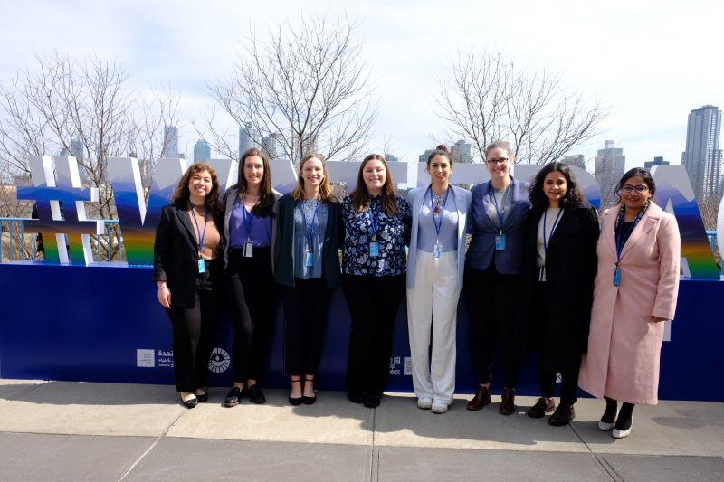 Melissa McCracken and Fletcher students pose for a photo at the UN Water Conference.