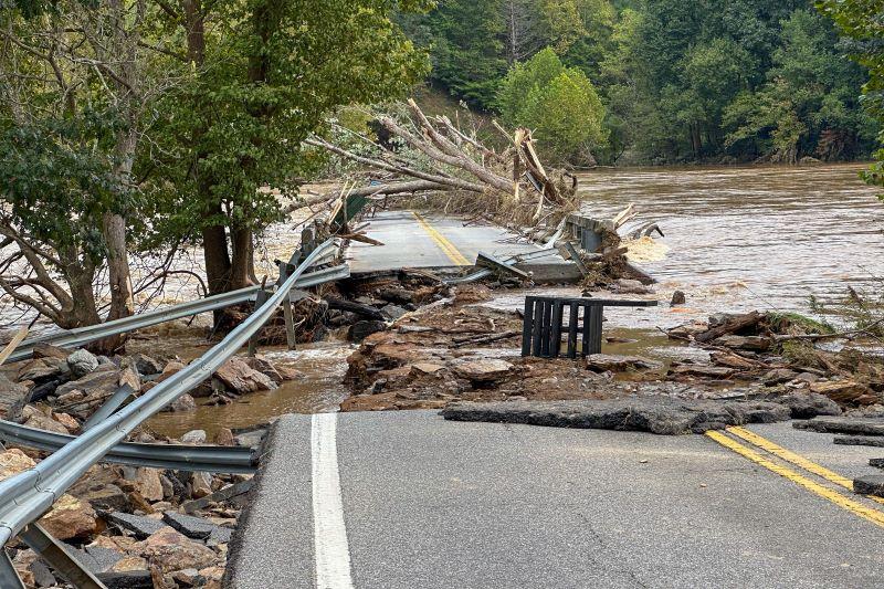 An image of a bridge that was destroyed and is now flooded in Virginia, following Hurricane Helene.