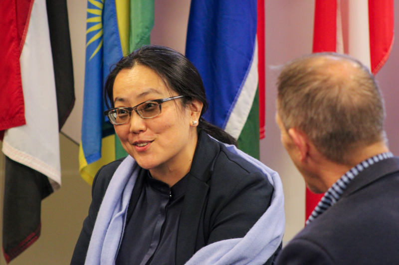 Ariunaa Batbold smiles while talking to somebody in the Hall of Flags