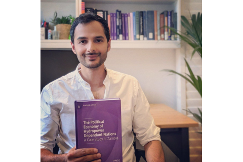 Imad Ahmed with his book The Political Economy of Hydropower Dependant Nations