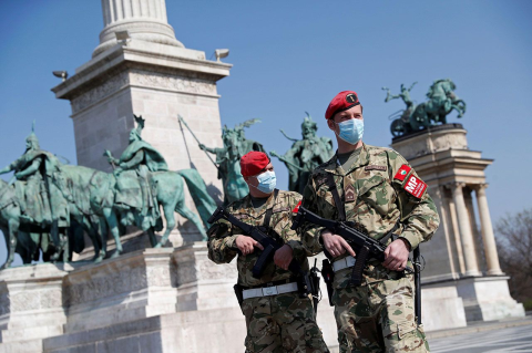 Military police officers on patrol in Heroes' Square in Budapest