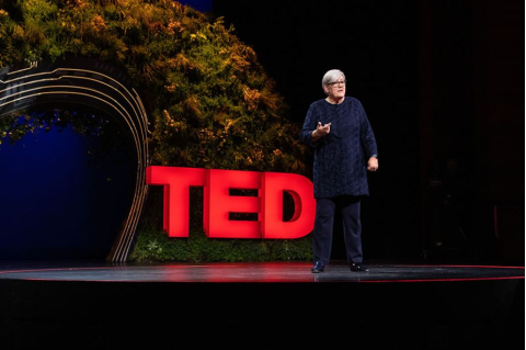 Dean Kyte on stage during a Ted Talk
