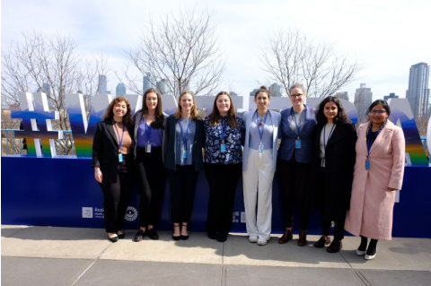 Melissa McCracken and Fletcher students pose for a photo at the UN Water Conference. 
