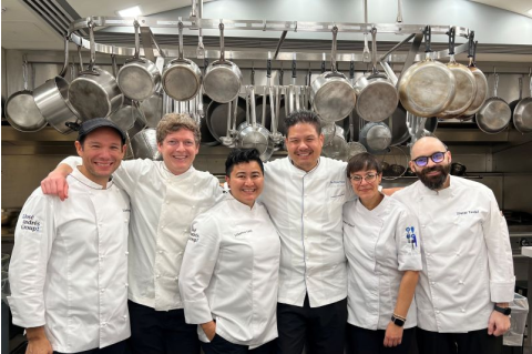 Sam Chapple-Sokol poses for a photo with other chefs in the White House kitchen.